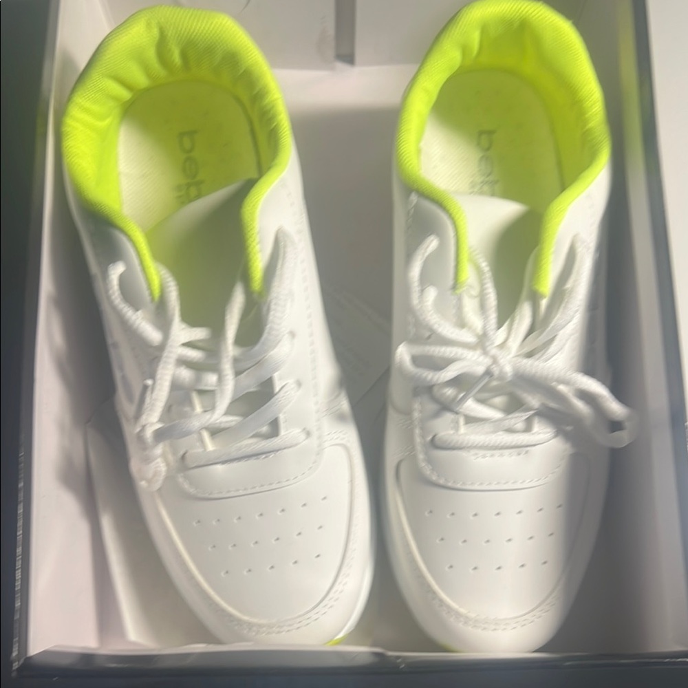 bebe Women Sneakers in White and Neon Yellow. New with the box but no tags.
